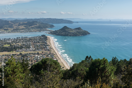 Elevated view of Pauanui township and beach, with Tairua and Mount Paku in the background. Coromandel Peninsula, New Zealand.