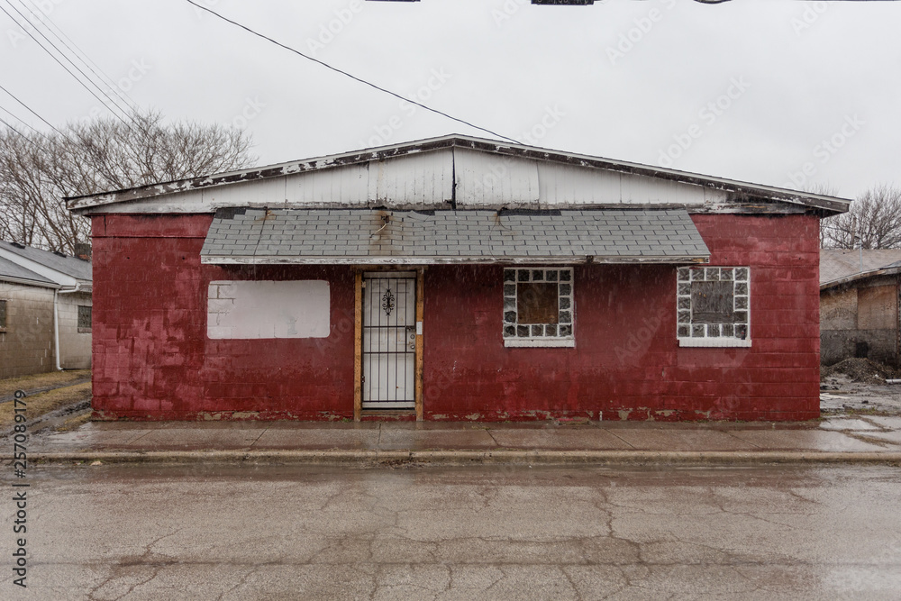 Old red brick building left abandoned in depressed urban area Old red brick building left abandoned in depressed urban area