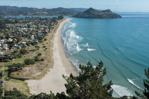 Elevated view of Pauanui township and beach, with Tairua and Mount Paku in the background. Coromandel Peninsula, New Zealand.