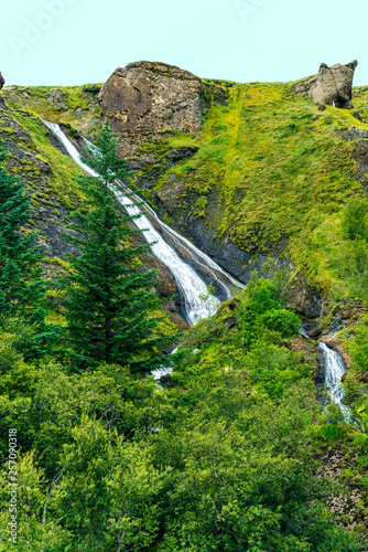 Close up view of Systrafoss waterfall in Kirkjubaejarklaustur village, Skaftarhreppur municipality of Southern Iceland. photo