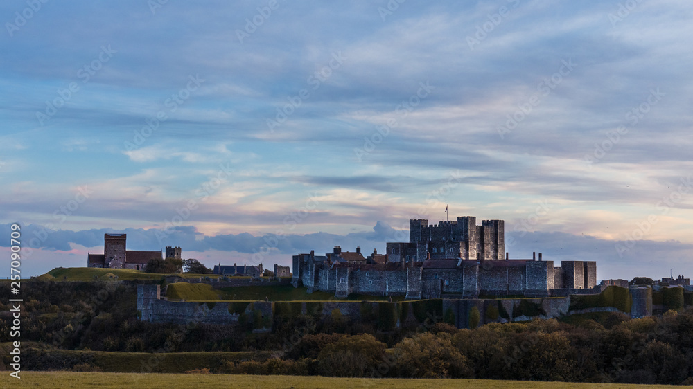 View of the medieval Dover Castle at sunset, the largest Castle in England, built by King Henry 2nd.