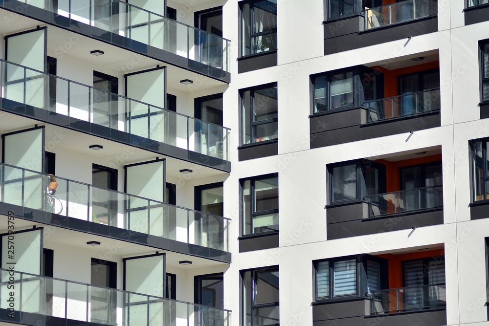 New-build residential building on a sunny summer day New-build residential building on a sunny summer day