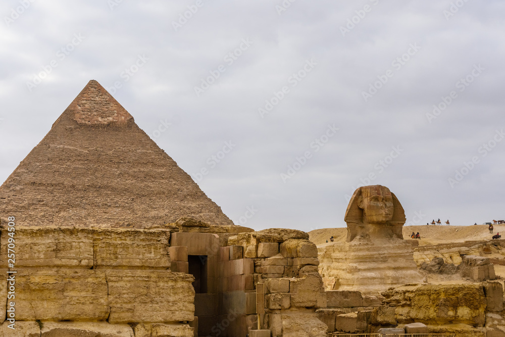 The great pyramid of Khafre and Sphinx in Giza plateau. Cairo, Egypt The great pyramid of Khafre and Sphinx in Giza plateau. Cairo, Egypt