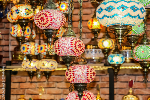 Traditional bright decorative hanging Turkish lamps and colourful lights with vivid colours  in the Istanbul Bazaar, Turkey © Abrar