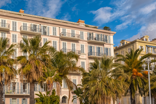 Nice, colorful houses promenade des Anglais, on the French Riviera, with palm trees © Pascale Gueret