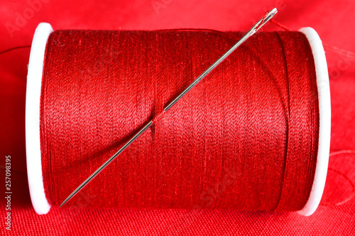 Red Thread and Sewing Needle Close Up