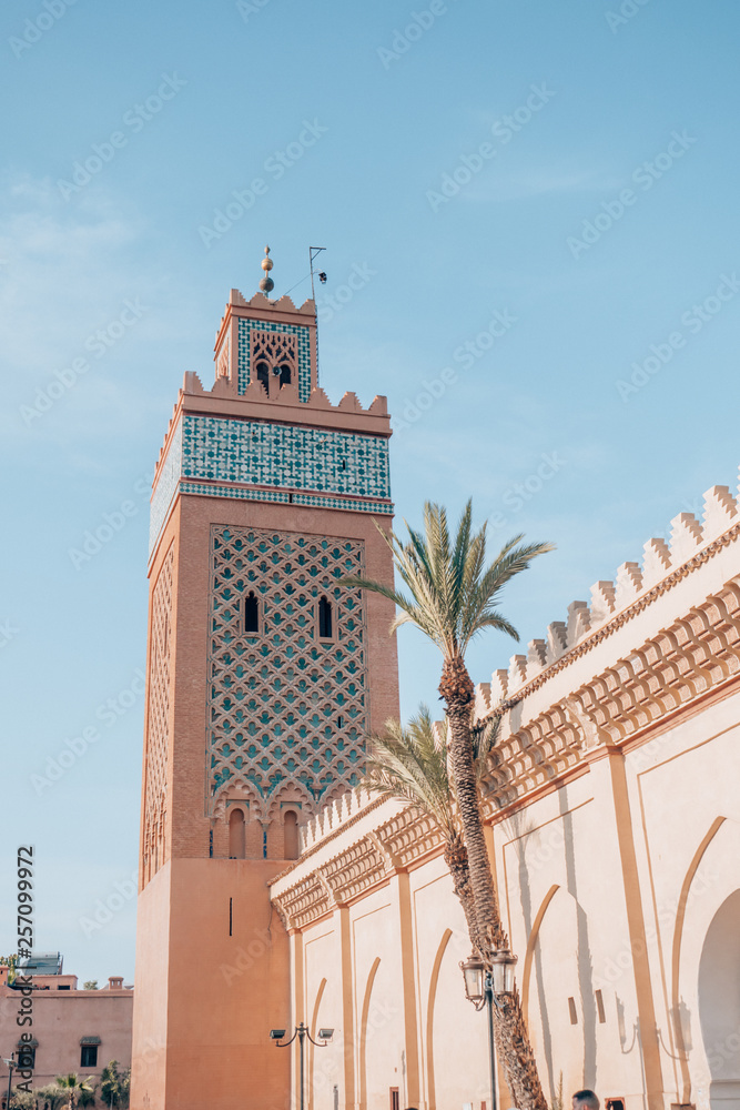 A beautiful designed minaret in the middle of the famous moroccan city Marrakech.