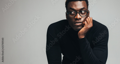Thoughtful young african guy