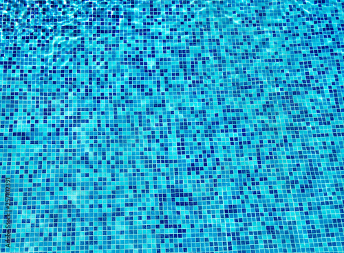 Surface of blue ripped water in swimming pool