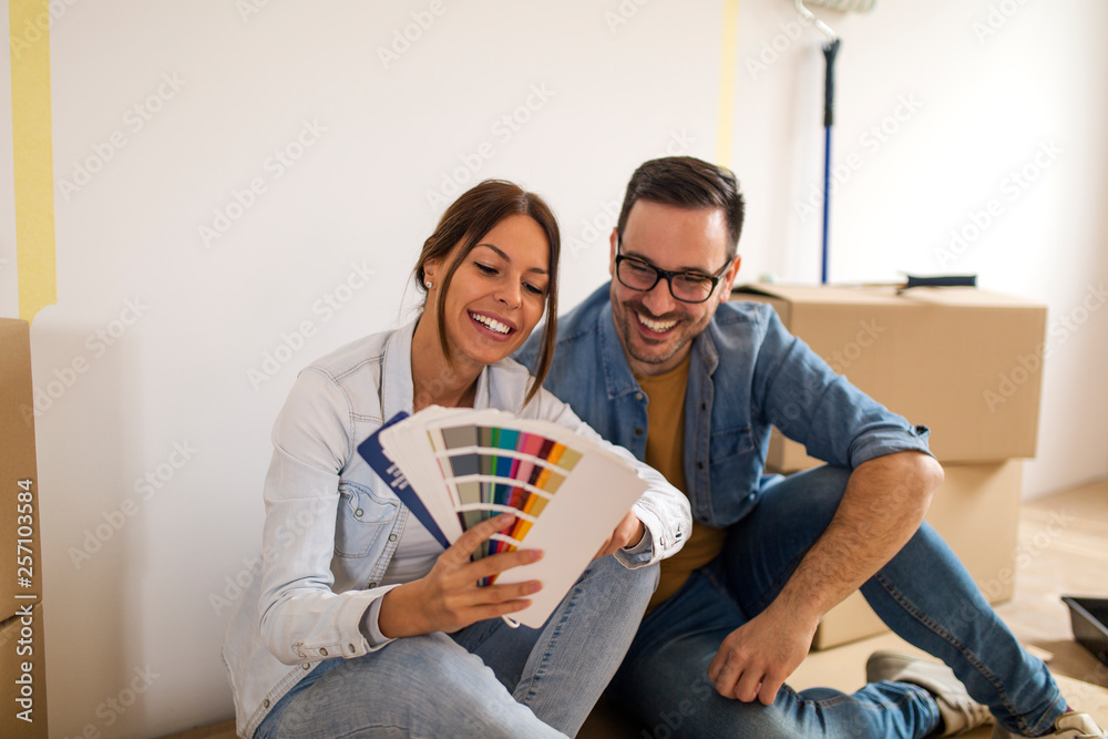 Happy couple in their new apartment. Happy couple in their new apartment.
