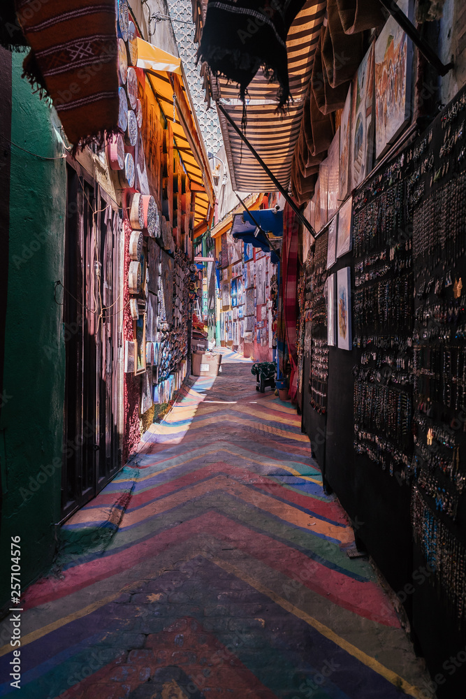 Fototapeta premium A colorful alley of the winding Medina in Fes.
