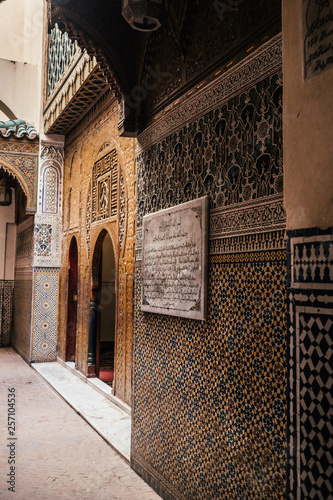 An oriental designed entrance to a prayer room from a mosque in the northern moroccan city Fez.