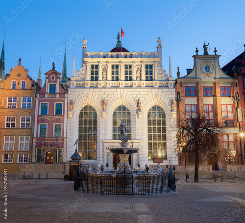 Fountain of the Neptune in old town of Gdansk, Poland. Long Lane architecture. Artus Yard.