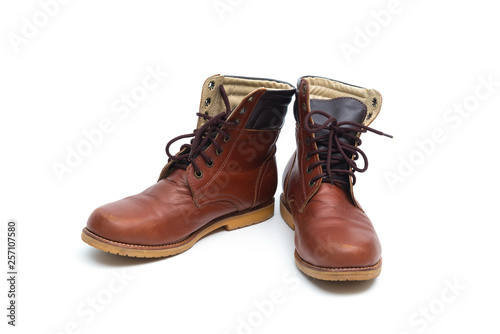 Male brown leather boot, footwear fashion isolated on white background.