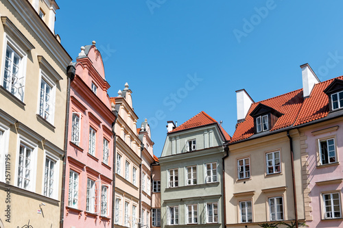 Warsaw  Poland Old town square with historic street town architecture and windows multicolored pattern of pink and yellow vintage color buildings