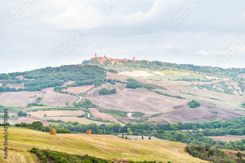 Pienza skyline and Italy Val D Orcia countryside in Tuscany with hilltop small town village high angle cityscape