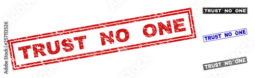 Grunge TRUST NO ONE rectangle stamp seals isolated on a white background. Rectangular seals with grunge texture in red, blue, black and gray colors.