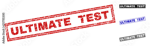 Grunge ULTIMATE TEST rectangle watermarks isolated on a white background. Rectangular seals with grunge texture in red, blue, black and grey colors.