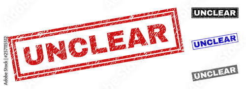 Grunge UNCLEAR rectangle stamp seals isolated on a white background. Rectangular seals with grunge texture in red, blue, black and gray colors.