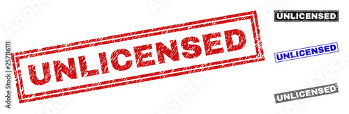 Grunge UNLICENSED rectangle stamps isolated on a white background. Rectangular seals with grunge texture in red, blue, black and gray colors.