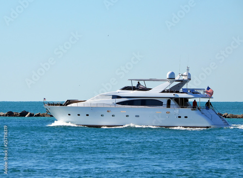White motor yacht exiting Government Cut off Miami Beach,Florida © Wimbledon