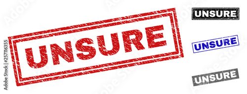 Grunge UNSURE rectangle stamp seals isolated on a white background. Rectangular seals with grunge texture in red, blue, black and gray colors.