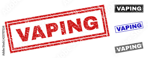 Grunge VAPING rectangle stamp seals isolated on a white background. Rectangular seals with grunge texture in red, blue, black and grey colors.