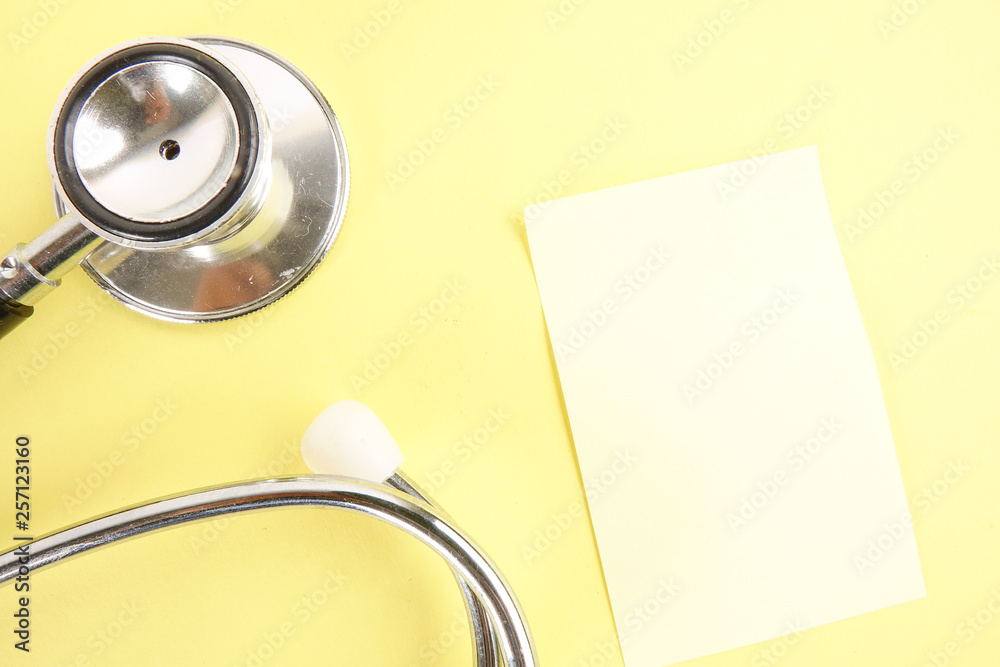 Medical Concept with stethoscope ,syringe isolated on yellow background. Copy Space Medical Concept with stethoscope ,syringe isolated on yellow background. Copy Space