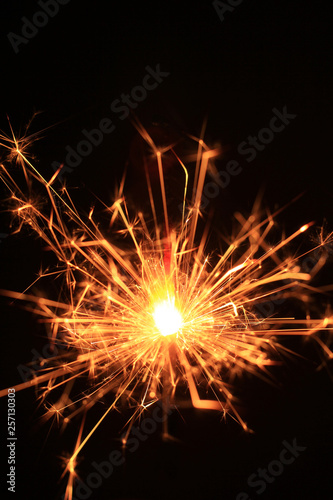 yellow sparks on a black background