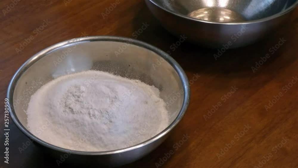 adding baking soda into a mixture adding baking soda into a mixture