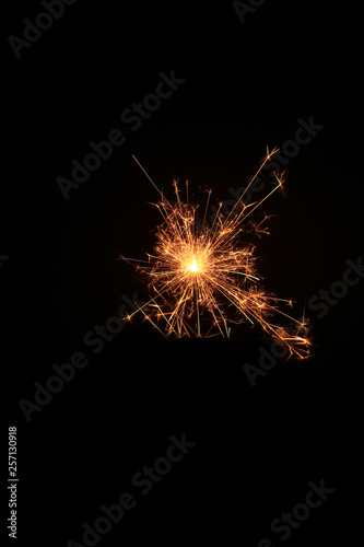 yellow sparks on a black background