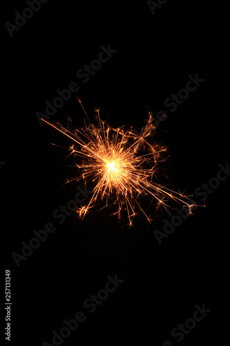 yellow sparks on a black background