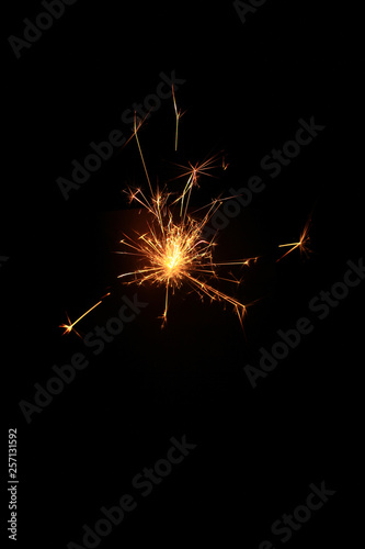 yellow sparks on a black background