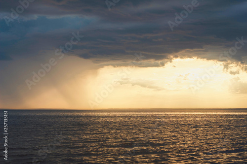 sunset on the sea, cloudy weather