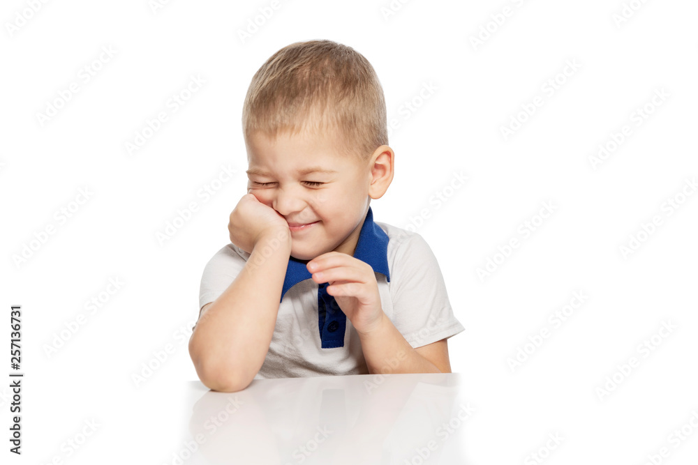 Cute little boy laughs, isolated on white background Cute little boy laughs, isolated on white background
