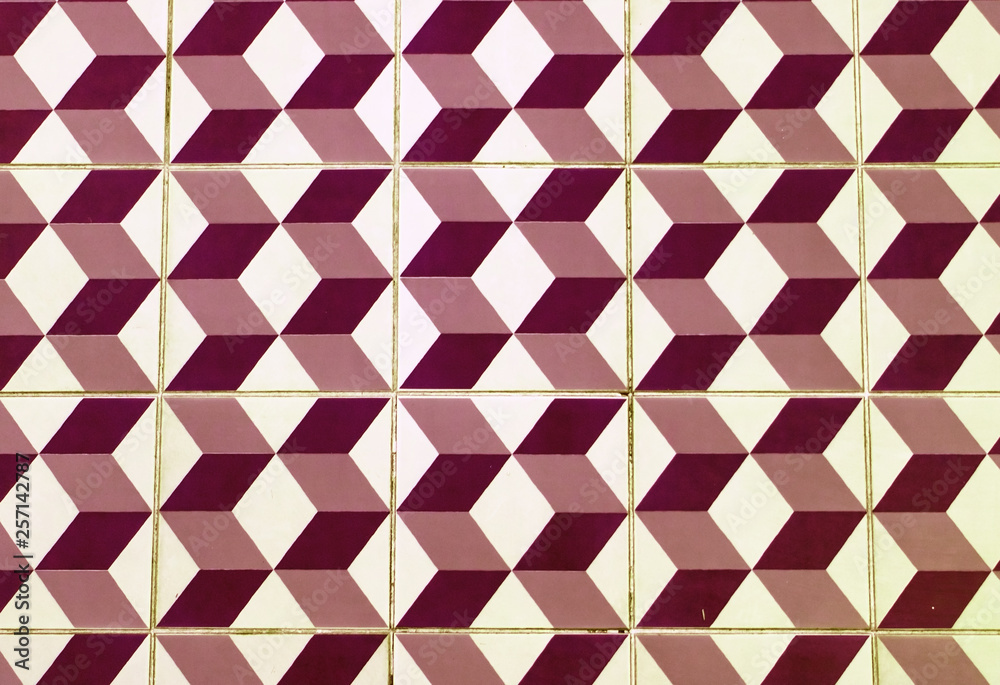 The floor of retro tiles. Repeating geometric patterns of dice on the floor of ceramic tile. The floor of retro tiles. Repeating geometric patterns of dice on the floor of ceramic tile.