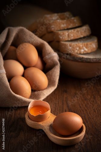 Fresh farm eggs on a wooden...