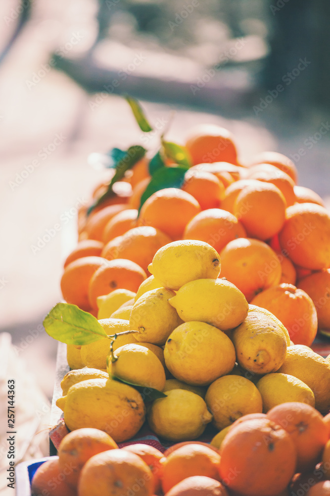 Fresh oranges and lemons close up. Fresh oranges and lemons close up.