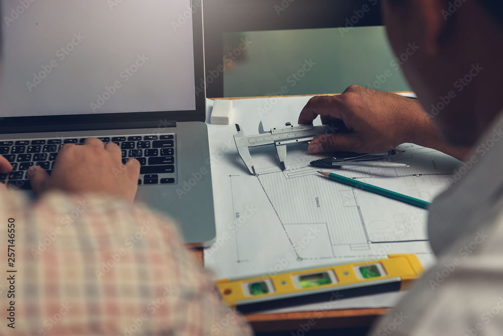Engineer and Architect concept, Engineer Architects office team working with blueprints Engineer and Architect concept, Engineer Architects office team working with blueprints