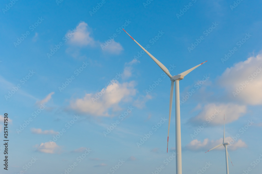 Wind energy converter as wind turbine ecology system clean power with blue sky. Wind energy converter as wind turbine ecology system clean power with blue sky.