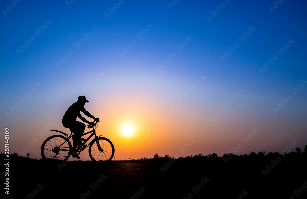 cyclist on sunset background cyclist on sunset background