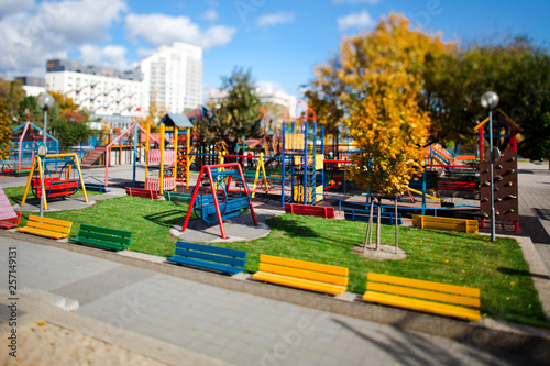 Colorful playground without children during summer time - Tilt shift lens