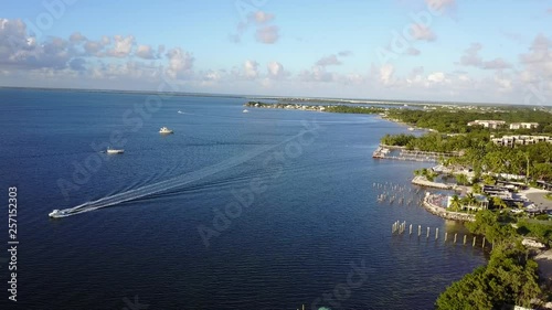 Wallpaper Mural AERIAL: still shot over the coast of Key Largo as a boat passes by. Torontodigital.ca