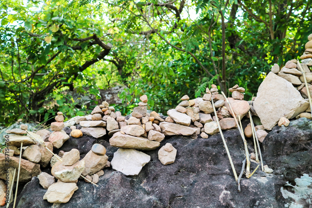 rock is arranged as a pagoda for worship of lord buddha rock is arranged as a pagoda for worship of lord buddha