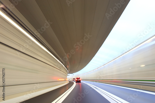 Car driving through the tunnel