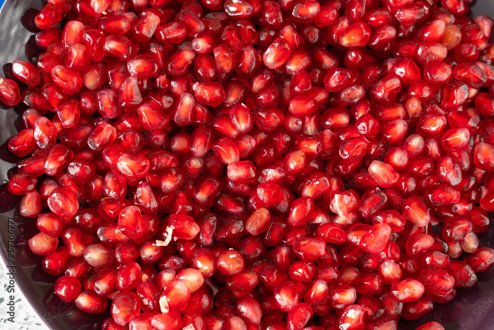 red ripe pomegranate seeds closeup. health food. beautiful background texture of pomegranate fruit seeds red ripe pomegranate seeds closeup. health food. beautiful background texture of pomegranate fruit seeds