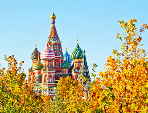 Domes of Cathedral of Vasily the Blessed (Saint Basil's Cathedral) against blue sky. Sunny autumn day. Red square. Moscow. Russia