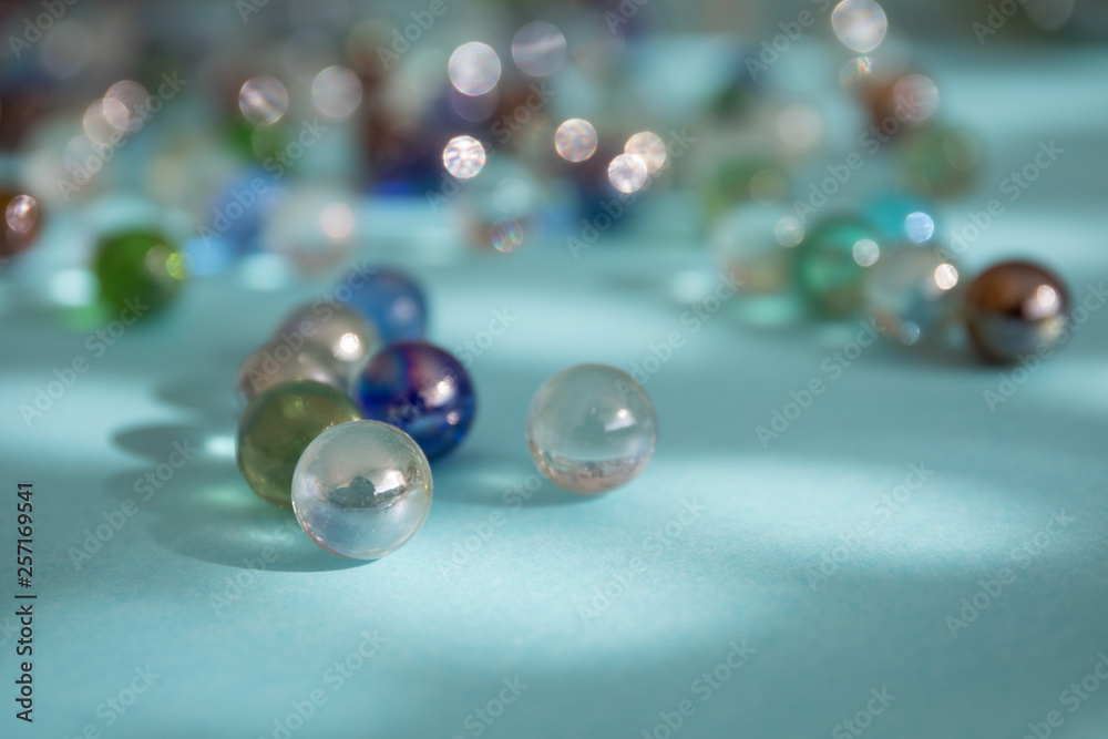 Colored beads on blue background