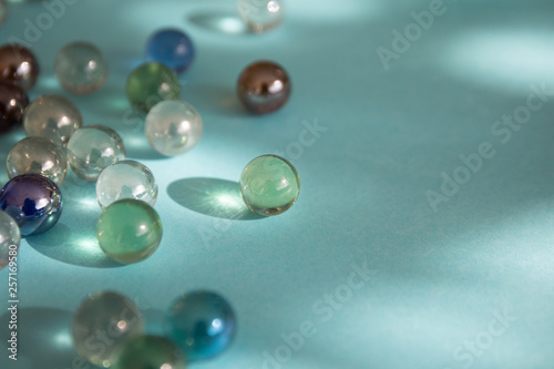 Colored beads on blue background