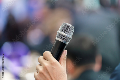 hand hold Microphone in meeting room for a conference